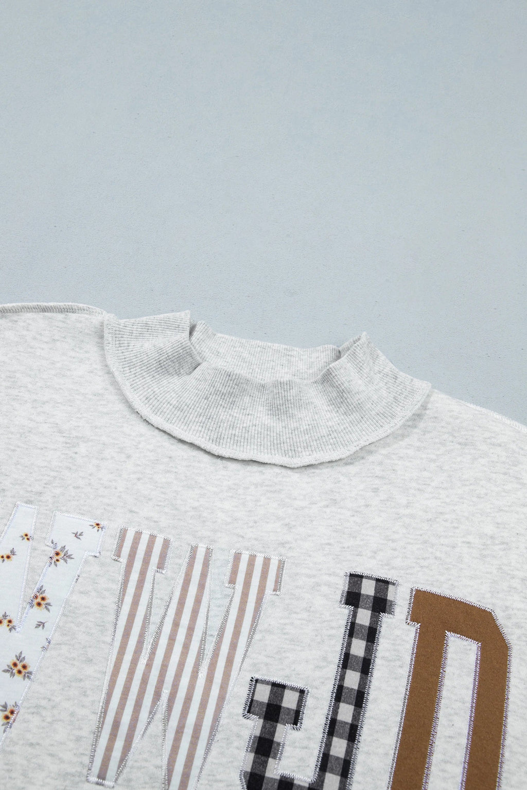 WWJD Embroidered Patchwork Mock Neck Sweatshirt