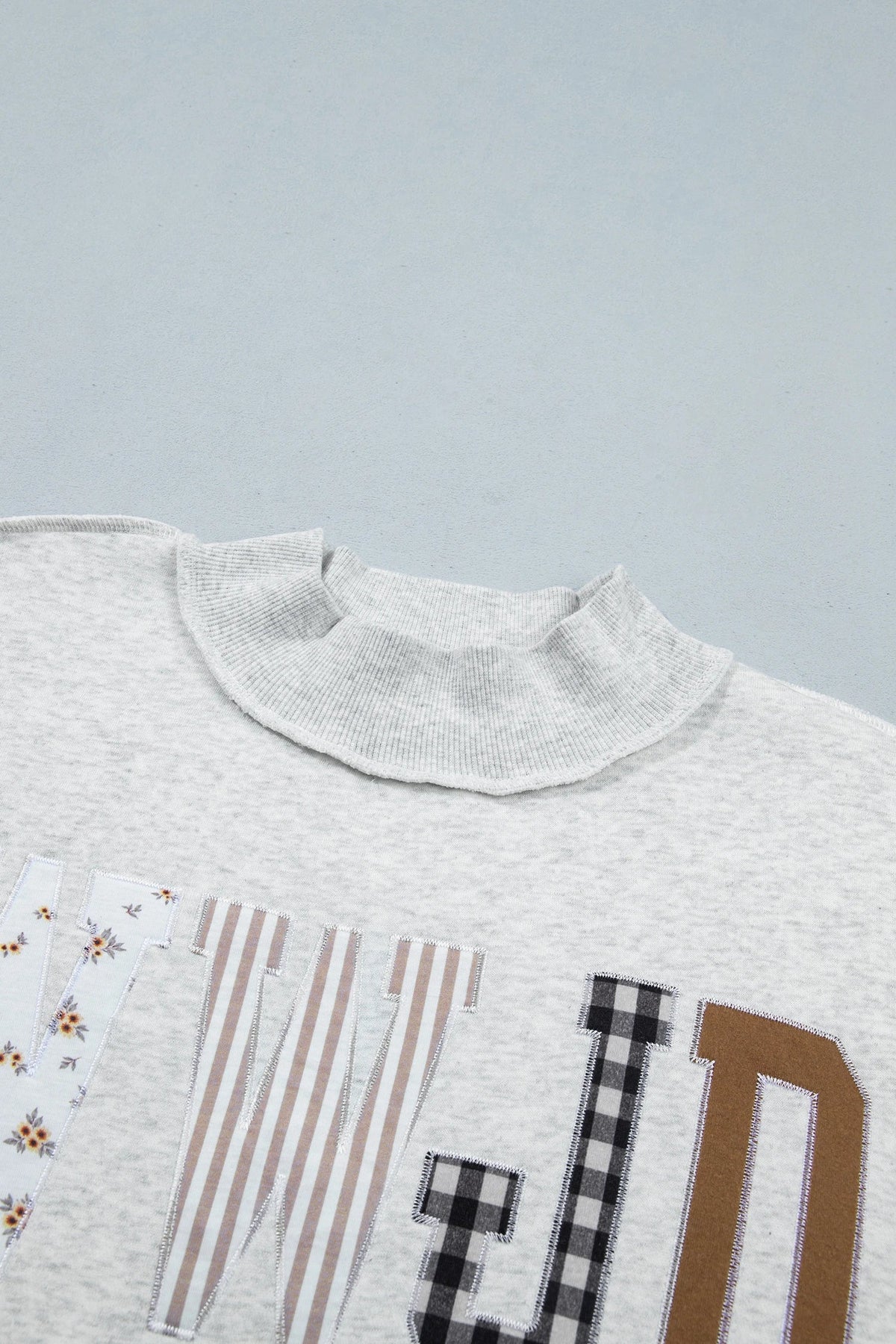 WWJD Embroidered Patchwork Mock Neck Sweatshirt